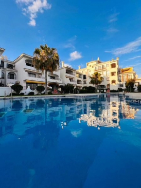 Renovated Apartment with Sea Views and Pool 6 min walk from Beach